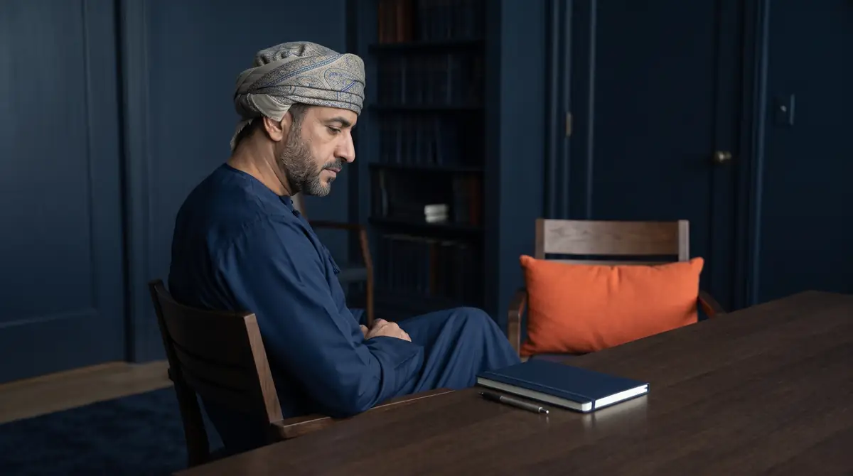 A business owner sitting at a desk